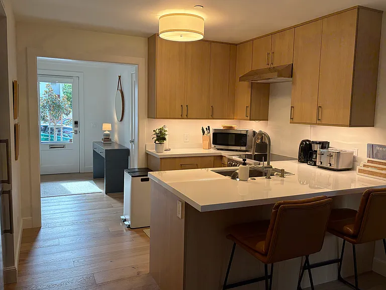 Kitchen and Entry View with Desk