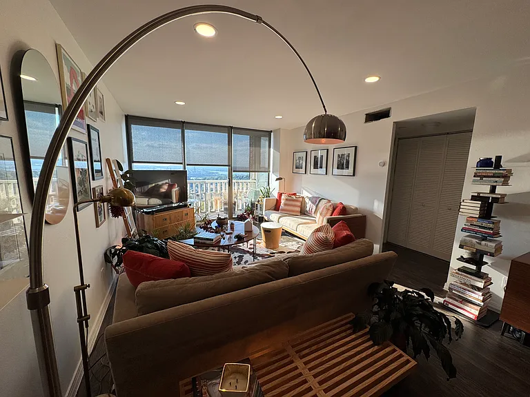 Past furnished living room photos for scale.