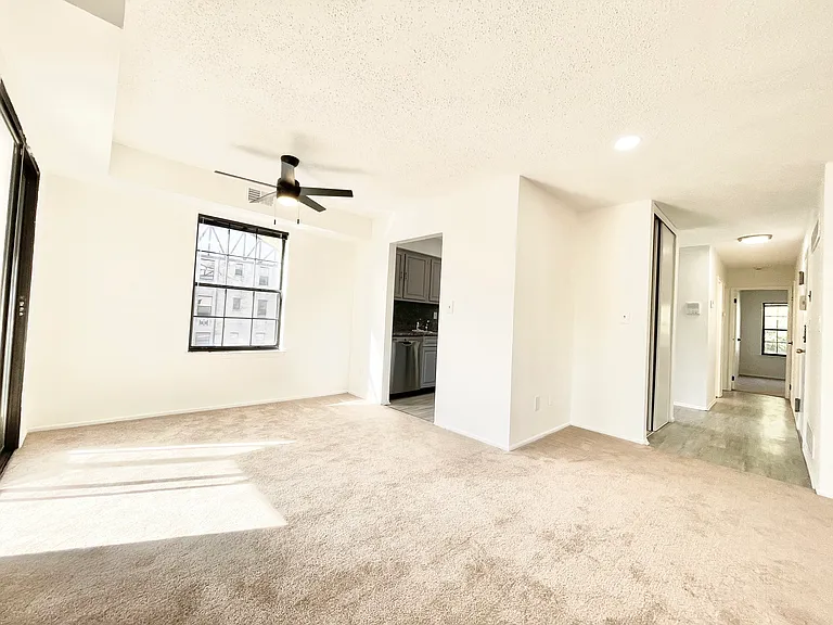 View of the dining area & hallway from the living area