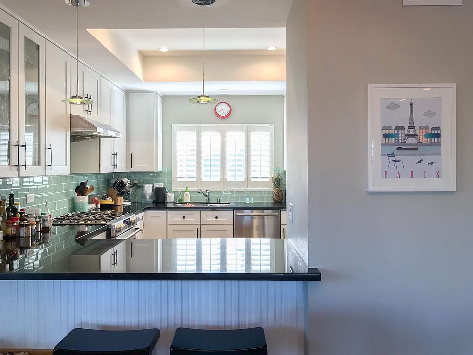 Kitchen opening to dining area