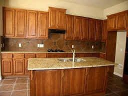 Gourmet Kitchen with 48" cabinets, island, and granite