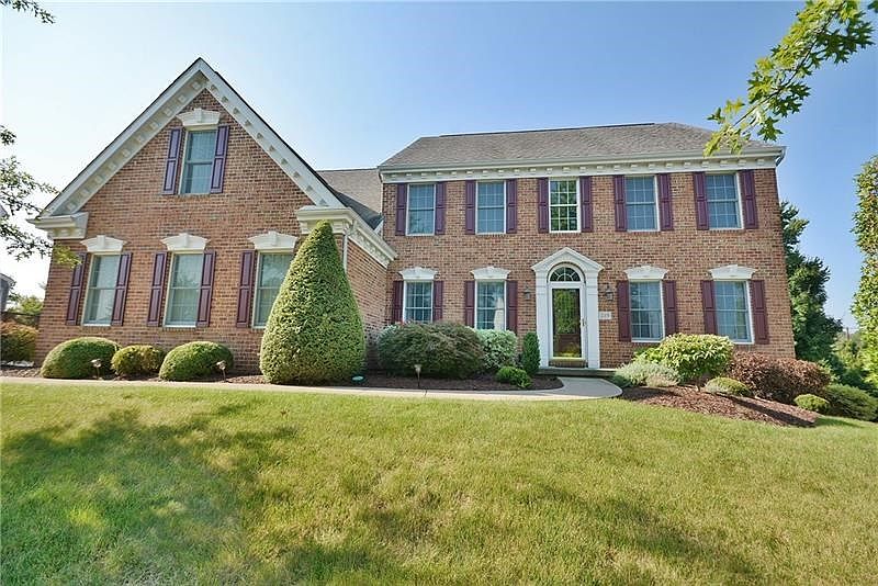 Welcome to 219 Molly Drive in the beautiful, tree-lined Hiddenbrook neighborhood of Peters Twp.