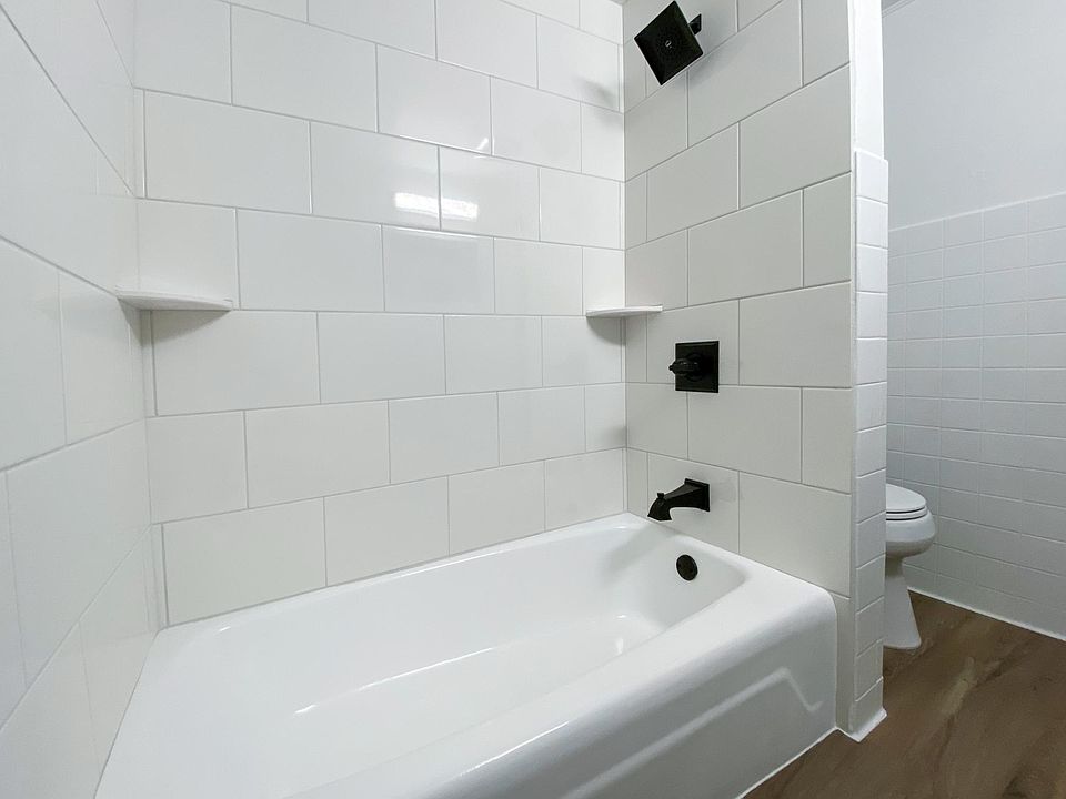 Updated bathroom with new shower, new toilet.