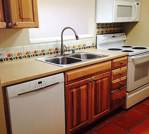 Full ht Hickory cabinets 