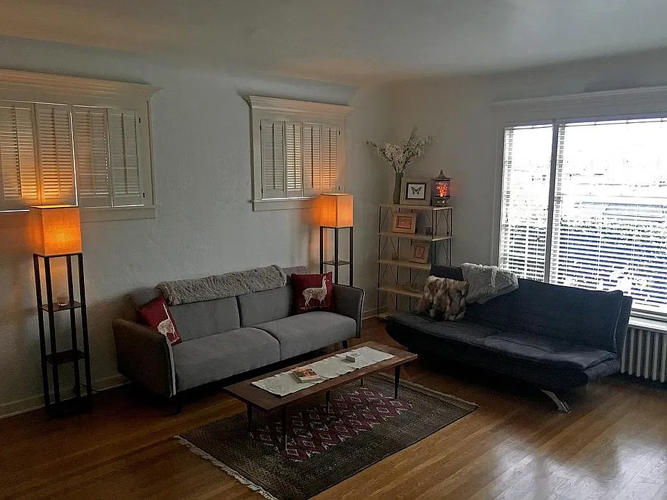 Spacious living room with 11 ft ceilings
