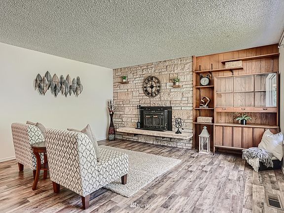 Mid-century Modern charm with fresh paint and Luxury Vinyl Plank throughout. 
