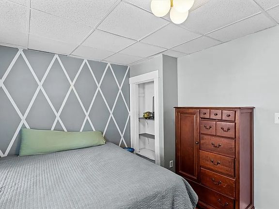 Main bedroom with access to front porch.