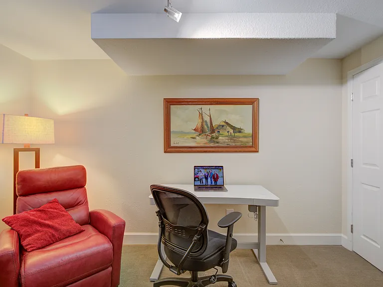 SIT STAND ELECTRIC DESK AND MESH OFFICE CHAIR AND RED LEATHER RECLINING CHAIR