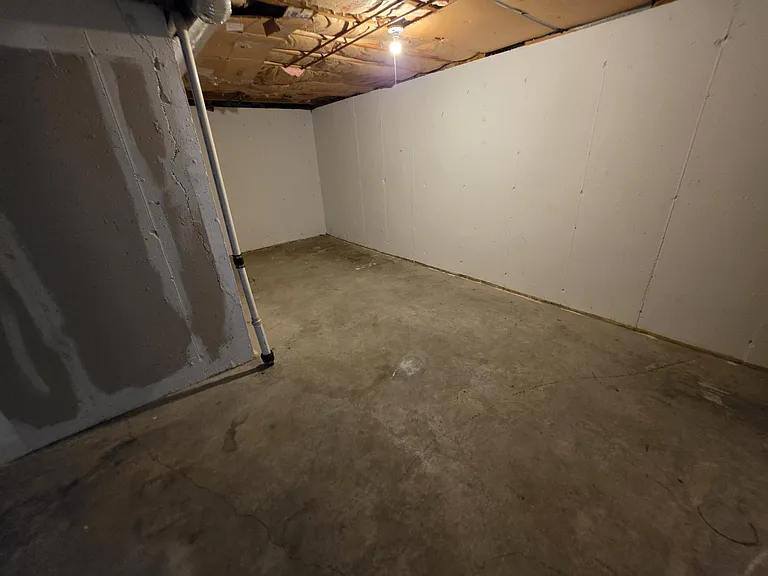 unfinished storage area in basement