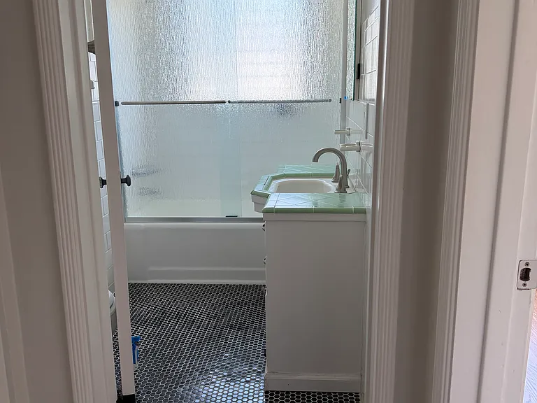 Bathroom with tub and shower.