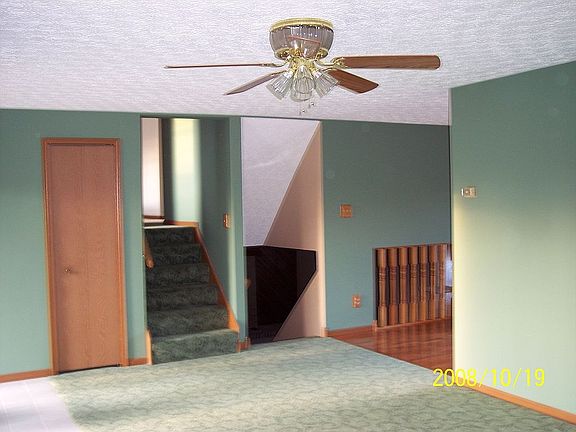 stairs up to bedrooms and down to family room