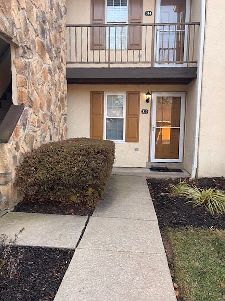 First floor private entrance with storm door
