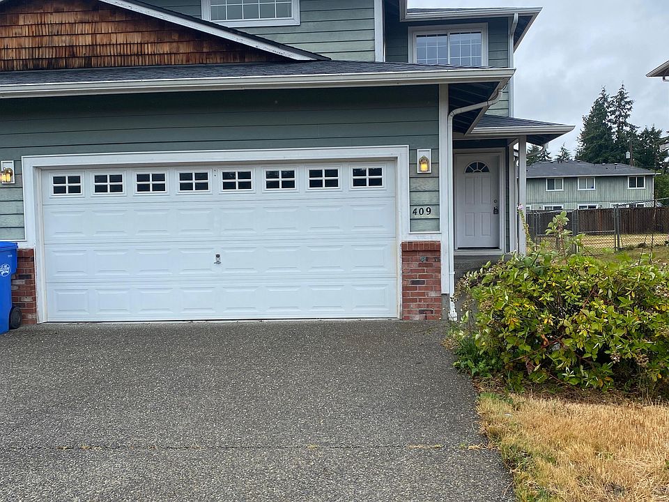Unit 409 has a 2-car garage space