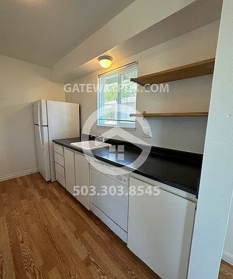 1441 NE Paropa Ct — Photo 11