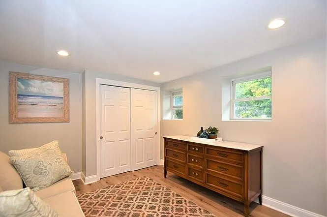 Bonus room or fourth bedroom (lower level). Currently has a sleeper sofa