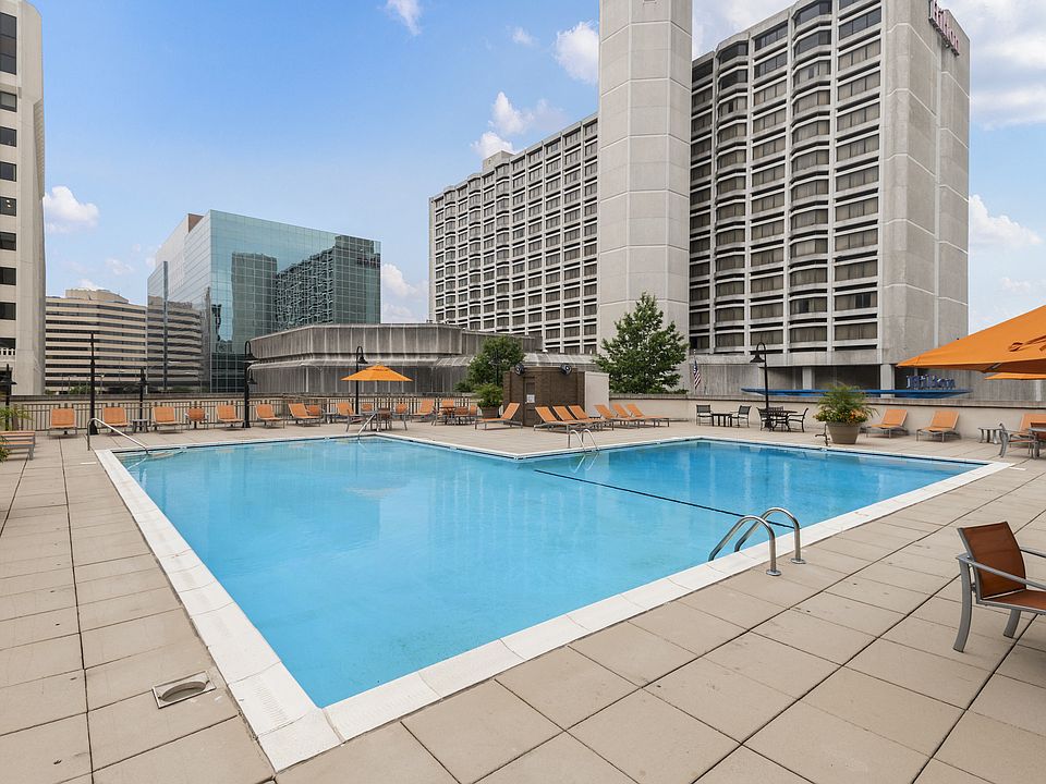 Sparkling Pool with Expansive Sundeck and Tanning Areas