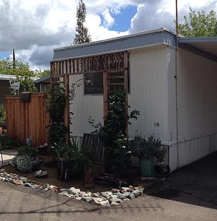 Front with rose trellis
