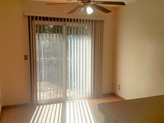 Eat-in kitchen with patio door and private deck.