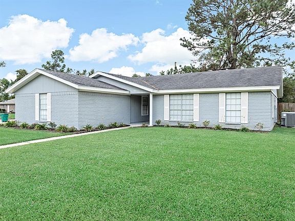 A sidewalk leads to the entry of this beautiful home. Notice the recently done landscaping!