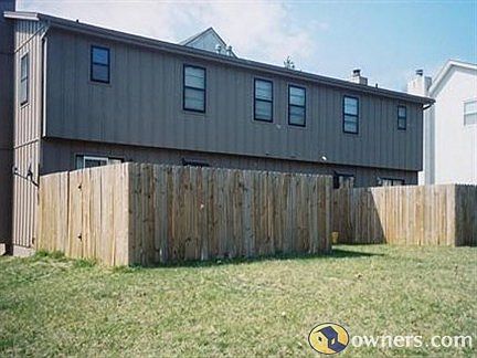 fenced in patio and yard