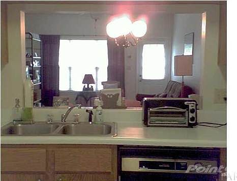 The kitchen is spacious and just off the garage and laundry room for easy un-loading of groceries.