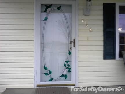 Front door
						:
						beautiful ,colorful inlay storm door