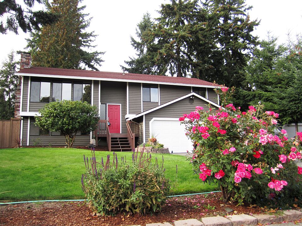 Beautiful flowers brighten up the front of the house.