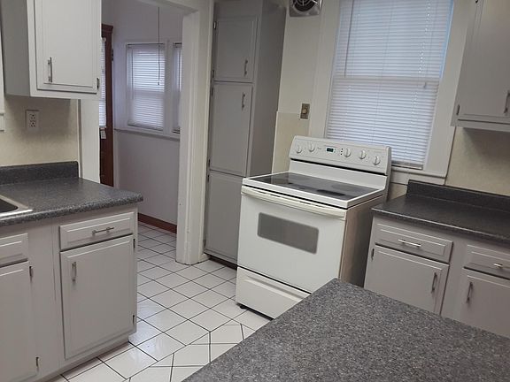 Kitchen - has fridge, range, d/w, disposer.