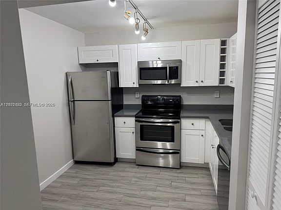 3rd image of 721 N Pine Island Rd APT 201