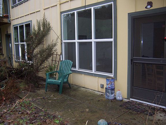 South-facing patio has room for gardening, grilling and relaxing.