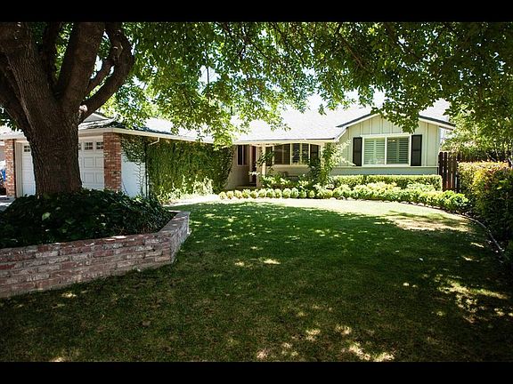 Custom brick work around mulberry tree.