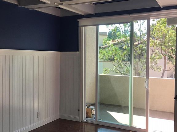 Master Bedroom & Balcony with box beam ceiling and wains