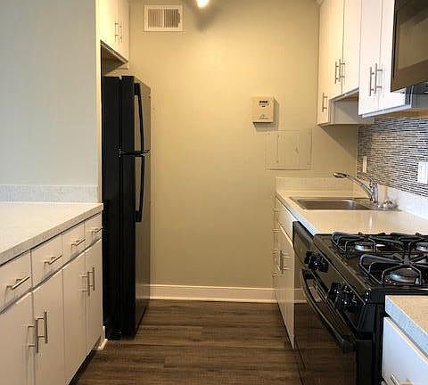 Upgraded tile flooring to compliment spacious kitchen