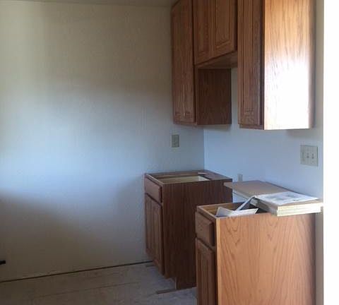 Kitchen, counters being installed