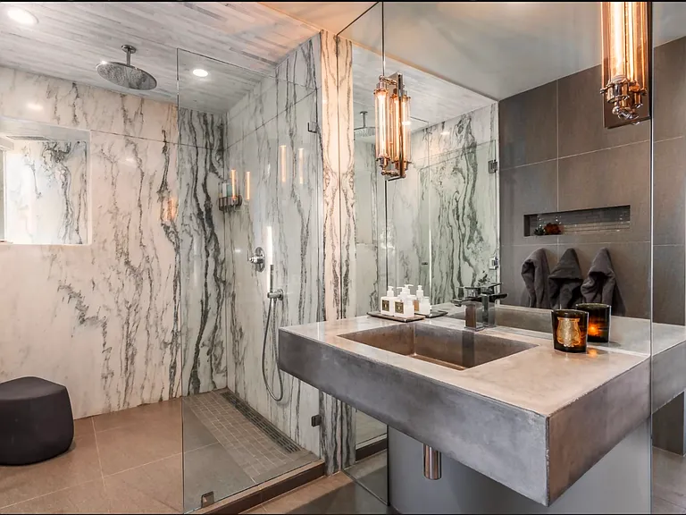 Sleek marble guest bathroom