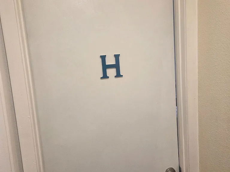 Room H, door clearly marked, 2nd story, keyed knob.
