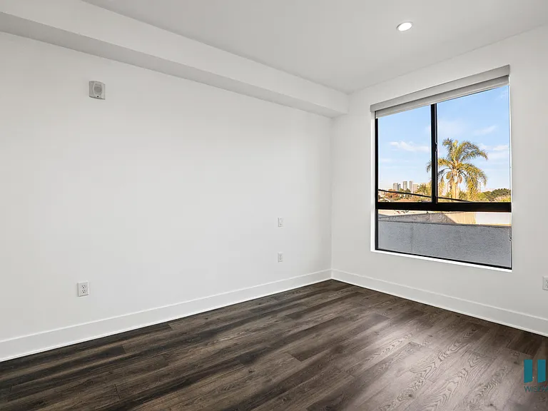 Bedroom with Large-Size Windows, Recessed Lighting, and Vinyl Flooring