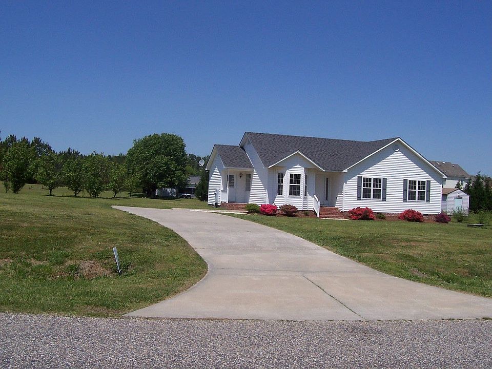 Front exterior or home features road frontage of 226 feet.