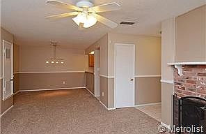 Large dining room with contemporary lighting