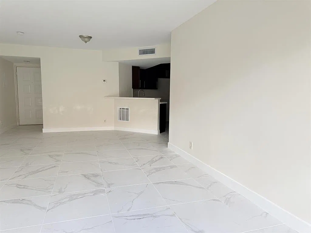 8801 Wiles Rd — Photo 2