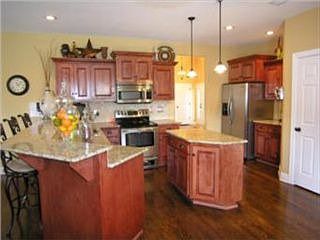 FAB Kitchen w/island, granite tops, SS appliances, walk-in pantry & Brkfst Bar