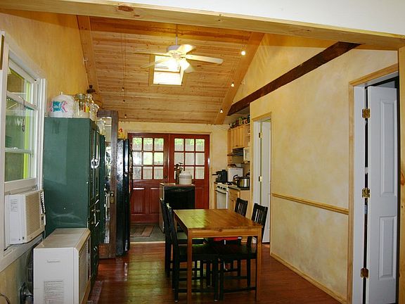 Dining/Kitchen - bedroom doors on right