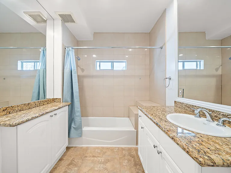 LARGE BATHROOM - TONS OF STORAGE AND NEW TILE