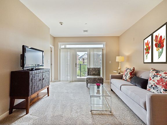 Living Room Opens to Balcony