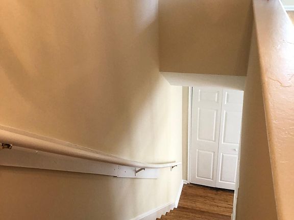 Stairs to lower first floor to Livingroom/Diningroom area.