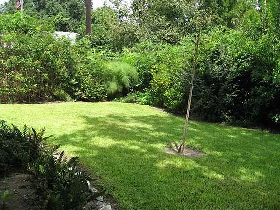 Nice size landscaped corner lot. Fenced backyard. Owner maintains yard