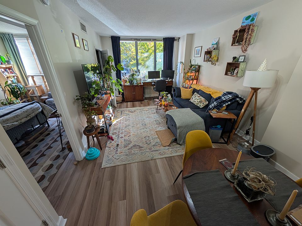 Large well-lit living room with dining area