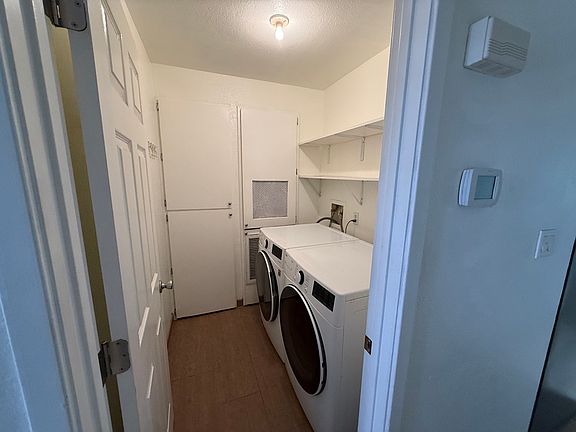 Laundry and storage room in unit!