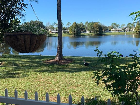 Backyard overlooking beautiful pond