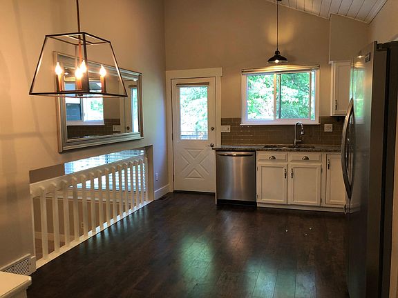 Updated kitchen with stainless steel appliances.